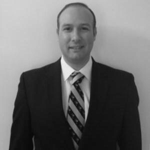 CIO of a multi-family office using the AlphaSeek platform on a tablet to analyze global private equity deal flow and manager performance.